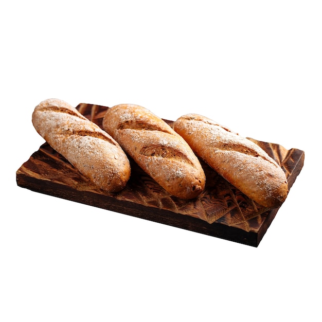 Isolated three loafs of white bread on a board