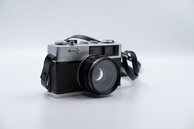 Isolated white background Beautiful vintage analog rangefinder film camera 70's Decade