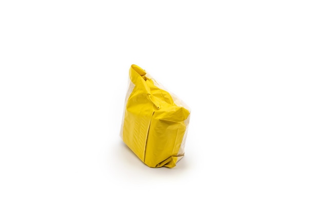 Isolated Yellow Postal Package from shopping online is delivered to the buyer It's shot in the studio light in front of white background