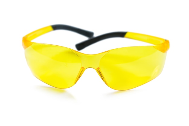 Isolated yellow safety glasses