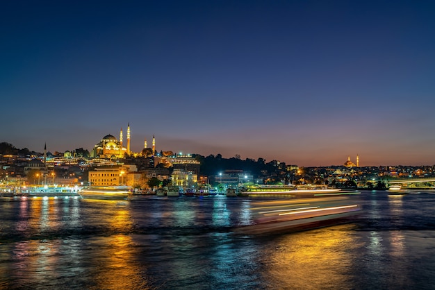 Istanbul city and Mosque at night in Turkey. and light tail