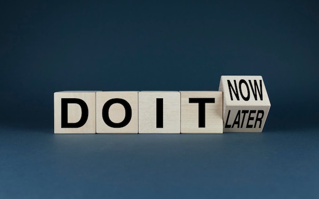 Do it now or later Cubes form words Do it now or Do it later Business motivation concept