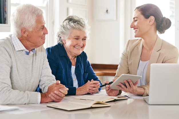 It pays to plan properly for the future Cropped shot of a senior couple getting advice from their financial consultant