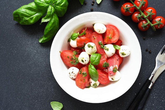 Italian appetizer caprese Classic caprese salad with tomatoes and mozzarella