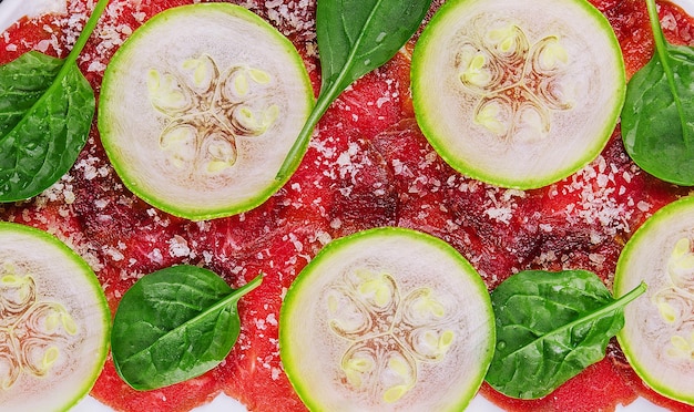 Italian beef carpaccio with sliced zucchini