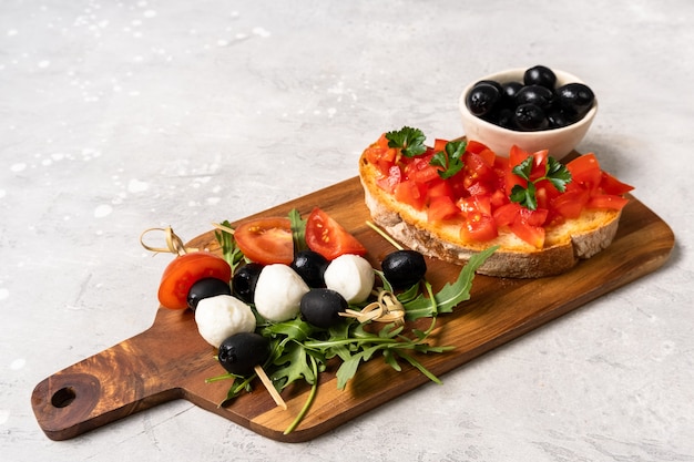 Italian bruschetta with tomatoes and olives