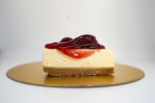 Italian Cheesecake served in a dish isolated on dark background top view of italian food