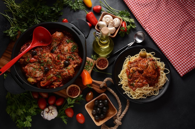 Italian chicken Cacciatore hunter's stew with spaghetti noodles