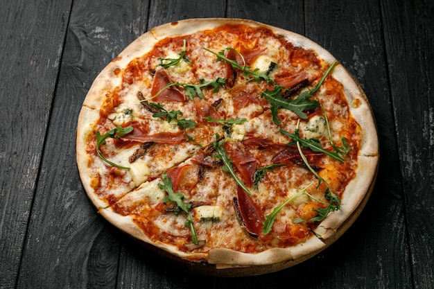 Italian cuisine Pizza on a black table