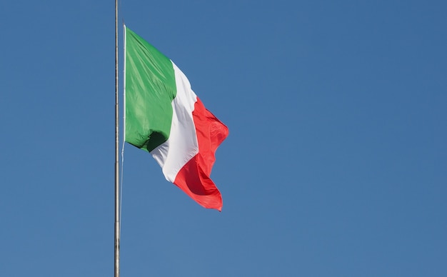 Italian Flag of Italy over blue sky