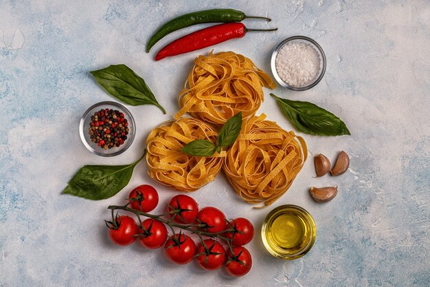 Italian food with pasta, spices and vegetables