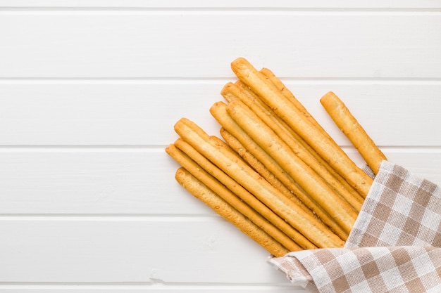 Photo italian grissini breadsticks tasty grissini snack on white table top view