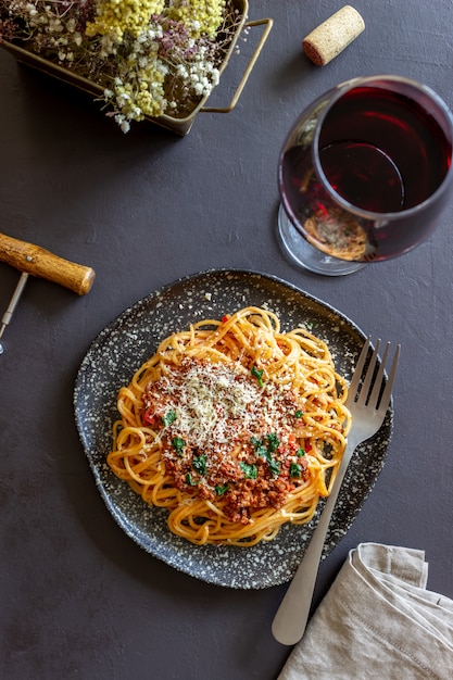 Italian pasta bolognese. Spaghetti. National cuisine. Recipe. Rustic.