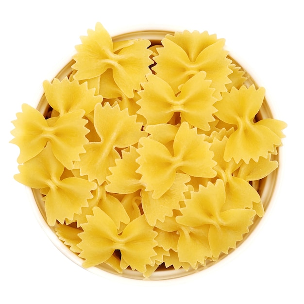 Italian pasta Farfalle in a white cup on a white background. View from above