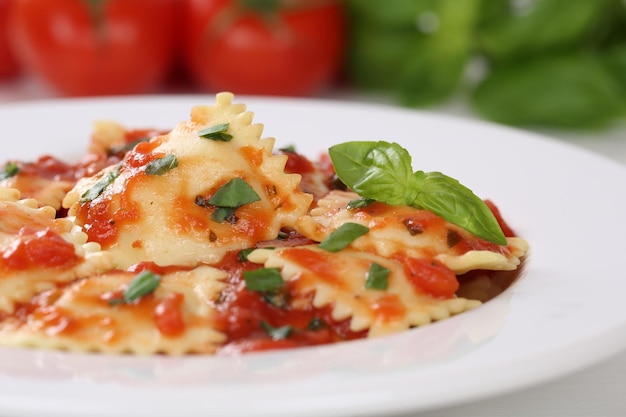 Italian Pasta Ravioli with tomatoes and basil meal