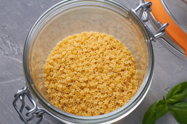 Italian pasta stelline in a glass jar