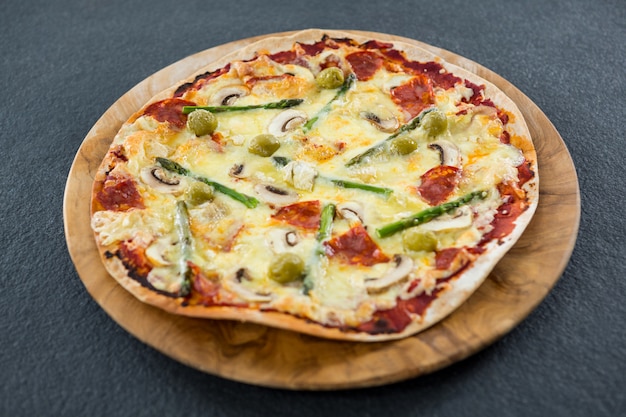 Italian pizza served in a pizza tray