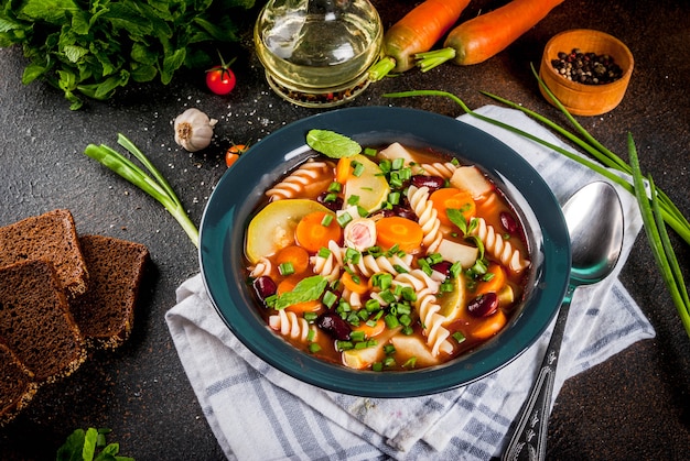 Italian vegetable soup Minestrone with fusilli pasta