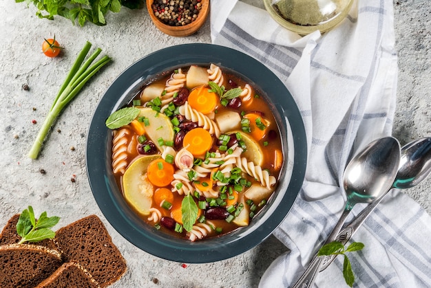 Italian vegetable soup Minestrone with fusilli pasta