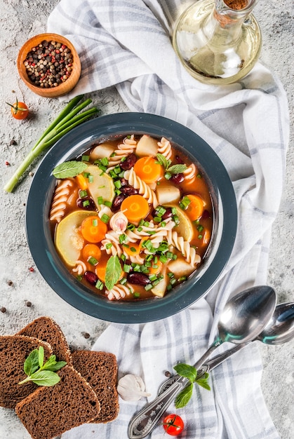 Italian vegetable soup Minestrone with fusilli pasta