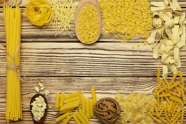 Italian whole grain pasta on a wooden table