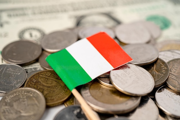 Italy Flag on coins background, Business and finance concept.