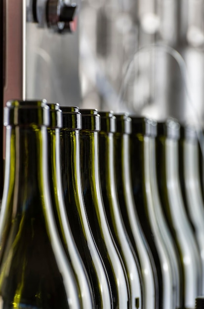 Italy Sicily wine bottles ready to be washed and filled with wine by an industrial machine in a wine factory