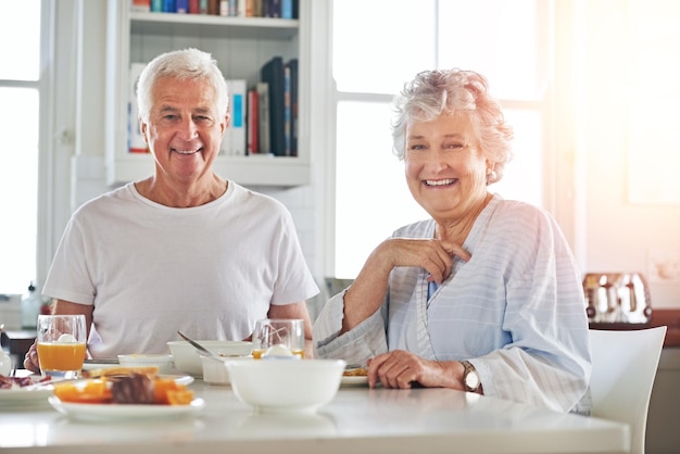 Its not just about sharing breakfast its about sharing love Portrait of a senior couple having breakfast together at home