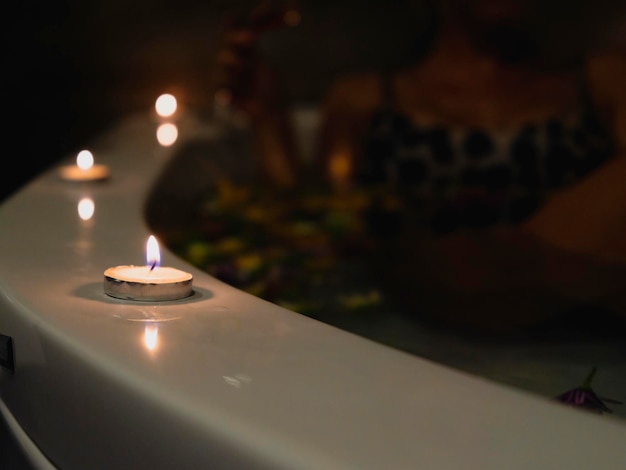 A jacuzzi and burning candles