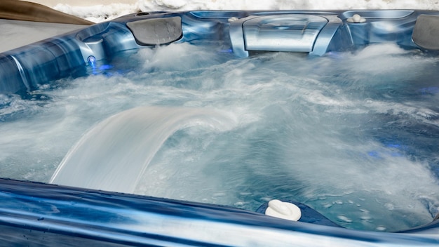 In the jacuzzi is gaining water close up relaxing in the spa