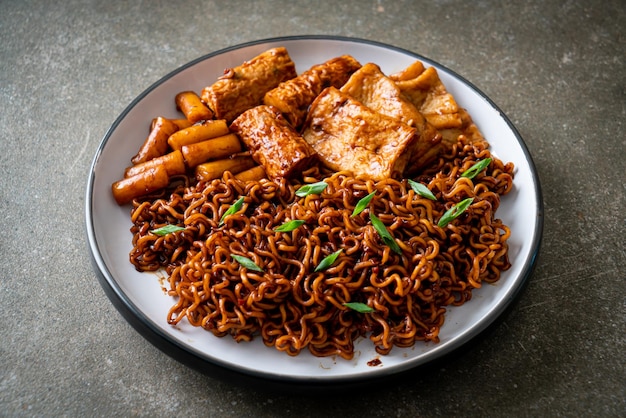 Jajangmyeon or JJajangmyeon with Odeng and Omuk Korean Instant noodles with Korean fish cake in black bean sauce