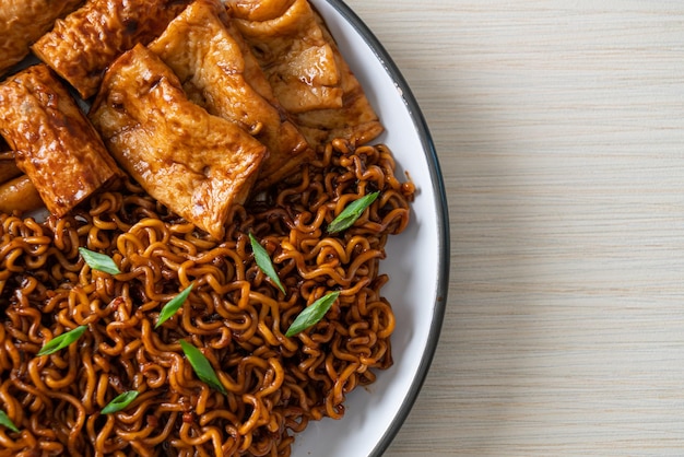 Jajangmyeon or JJajangmyeon with Odeng and Omuk Korean Instant noodles with Korean fish cake in black bean sauce