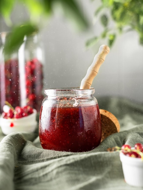 jam made from red berries. home preservation. strawberry and red currant jam