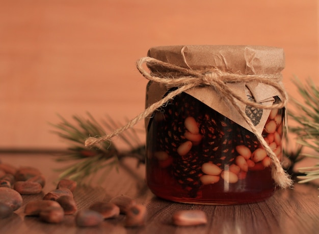 Jam made of green pine cones with pine nut kernels