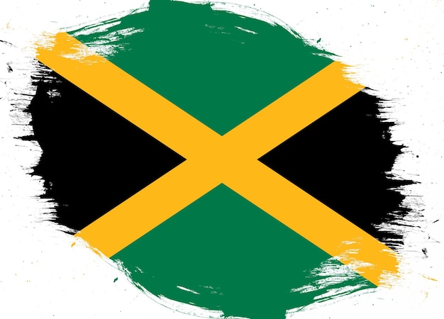 Jamaica flag on distressed grunge brush background