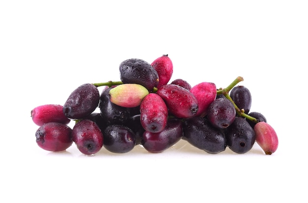 Jambolan plum or Java plum with water drops on white background