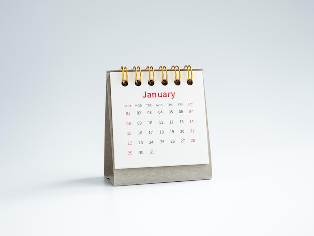 A January 2023 calendar desk for the organizer to plan and reminder isolated on white background minimal style White small table calendar with the page of the first month Happy new year 2023