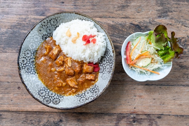 Japanese Curry Rice With Pork On Wooden Background