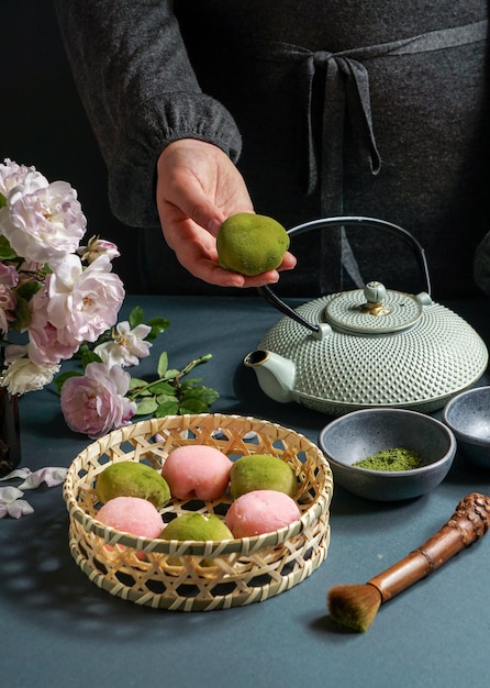 Japanese dessert mochi with matcha green tea powder and cherry japanese tea ceremony