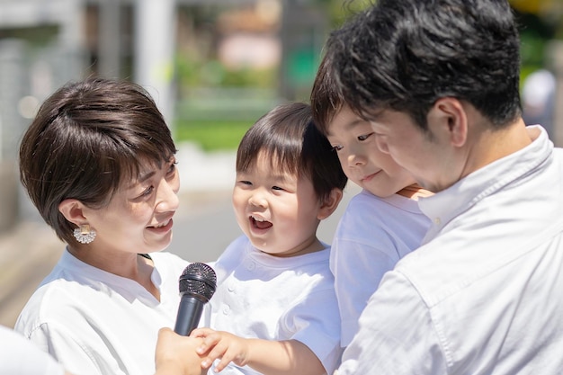 Japanese family interviewed on the street of Tokyo