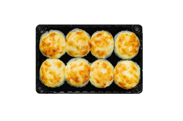 Japanese food, baked rolls with cheese cap in black box isolated on white background.