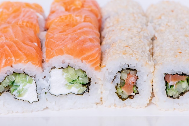 Japanese food rolls in sesame with salmon cucumber Philadelphia cheese Food delivery