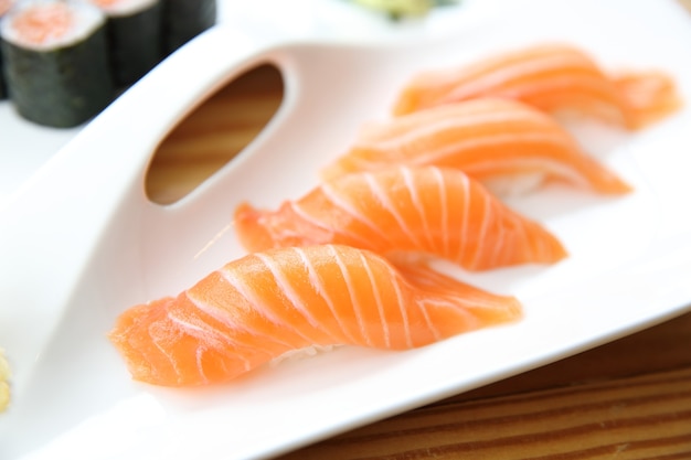 Japanese food Salmon Sushi set on wood background