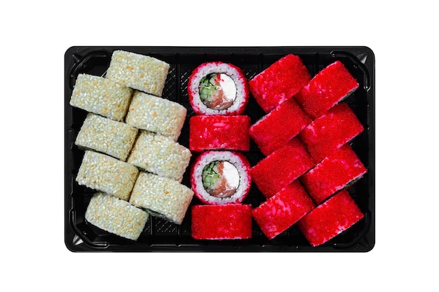 Japanese food, set of rolls in white sesame and red masago caviar in black box isolated on white background.