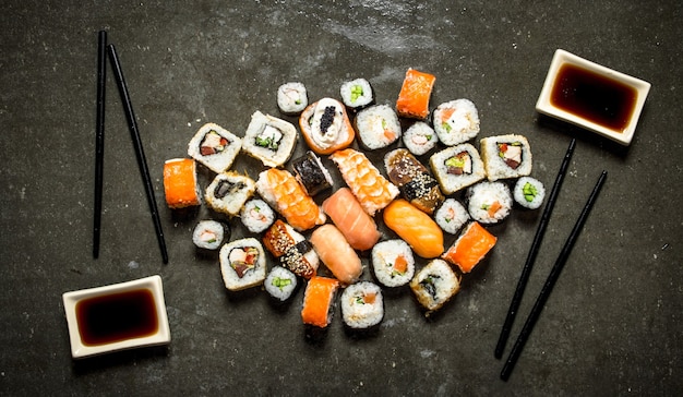 Japanese food. A variety of rolls and sushi with seafood and soy sauce.