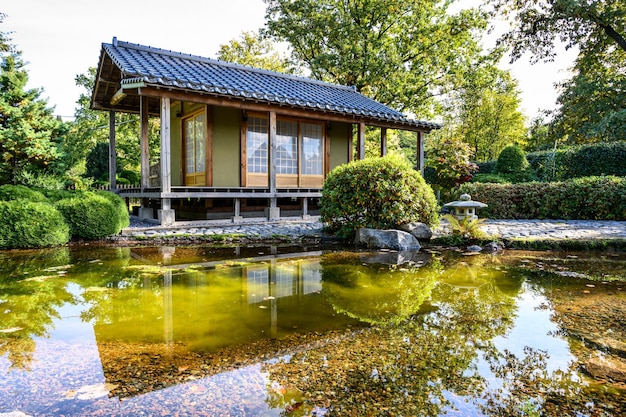 Japanese Garden botanical park in early autumn japanese house