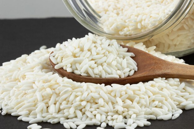 Japanese moti rice on wooden spoon Selective focus