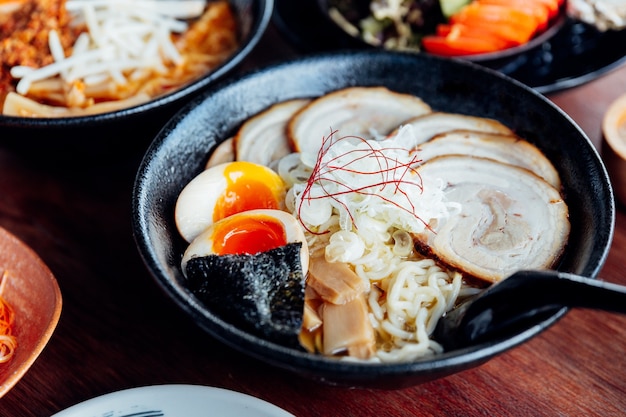 Japanese noodle in Miso soup with chashu pork, boiled egg, dry seaweed.