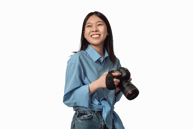 Japanese Photographer Lady Posing Holding Photo Camera Over White Background