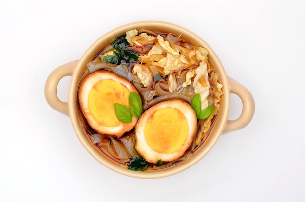 Japanese ramen soup in bowl on white background